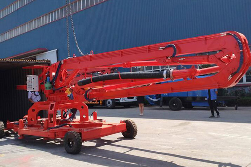 Mobile Concrete Placing Boom Loaded Into Container